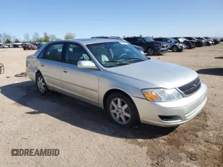 2000 Toyota Avalon XL with VIN 4T1BF28B5YU031947, listed as a Copart auction lot 56239265 with 167,627 mi miles and Salvage title. Bid and sale history available at DreamBid. Image 4.