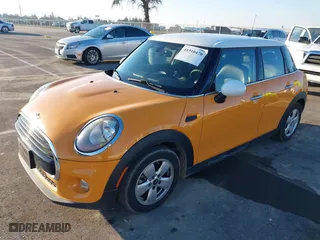 2017 MINI Hardtop 4 Door Cooper with VIN WMWXU1C58H2E17690, listed as a IAAI auction lot 41310470 with 62821 miles. Bid and sale history available at carsss.com. Image 17.