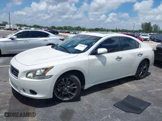 2014 Nissan Maxima 3.5 S with VIN 1N4AA5AP5EC490392, listed as a IAAI auction lot 39364218 with 104,432 mi miles. Bid and sale history available at carsss.com. Image 2.