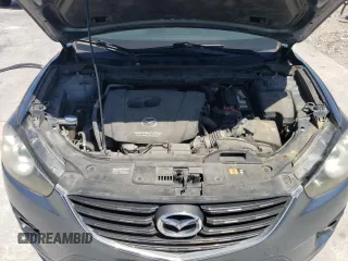 2016 Mazda CX-5 Touring with VIN JM3KE2CY3G0635643, listed as a Copart auction lot 52949105 with 179,464 mi miles and Clean Title. Bid and sale history available at carsss.com. Image 12.