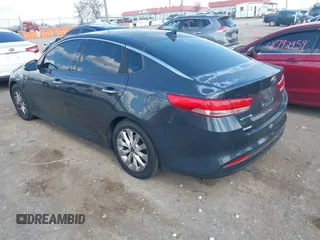 2016 Kia Optima EX with VIN 5XXGU4L30GG014019, listed as a IAAI auction lot 41786540 with 112,894 mi miles and . Bid and sale history available at carsss.com. Image 3.