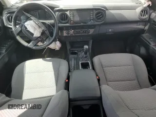 2021 Toyota Tacoma SR z VIN 3TMCZ5ANXMM375679, wystawiony jako Copart lot #58207995 z przebiegiem Nie podano mil oraz Szkoda całkowita • Salvage title. Historia ofert i sprzedaży dostępna na DreamBid. Obrazek 8.