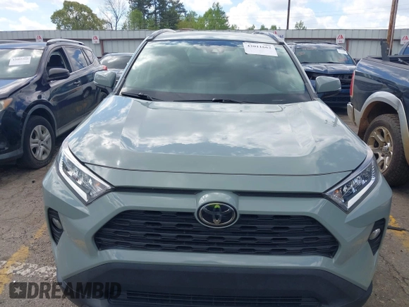 2019 Toyota RAV4 XLE with VIN 2T3W1RFV3KW056351, listed as a IAAI auction lot 42011662 with 64,634 mi miles. Bid and sale history available at carsss.com. Image 12.