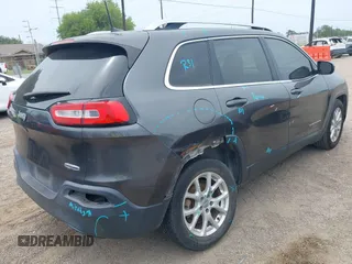 2017 Jeep Cherokee Latitude with VIN 1C4PJLCB1HW574447, listed as a IAAI auction lot 42395204 with 102,985 mi miles and . Bid and sale history available at DreamBid. Image 4.
