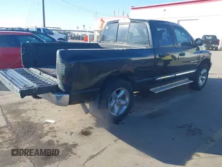 2006 Dodge Ram 1500 SLT with VIN 1D7HU18256S647953, listed as a IAAI auction lot 41430894 with 209,656 mi miles. Bid and sale history available at carsss.com. Image 4.