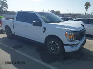 2023 Ford F-150 XL with VIN 1FTEW1CP8PKE43997, listed as a IAAI auction lot 41653536 with 36,053 mi miles. Bid and sale history available at carsss.com. Image 1.