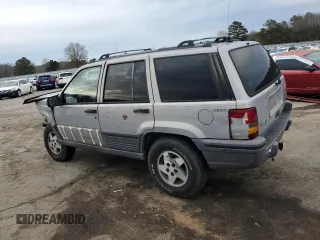 1995 Jeep Grand Cherokee Laredo with VIN 1J4GZ58S7SC517783, listed as a Copart auction lot 43057145 with 225,273 mi miles and Salvage Title. Bid and sale history available at carsss.com. Image 2.