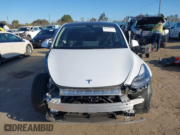 2023 Tesla Model Y Long Range with VIN 7SAYGDEE1PA128818, listed as a IAAI auction lot 41622062 with 19,089 mi miles. Bid and sale history available at carsss.com. Image 13.