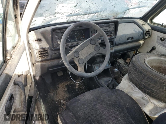1984 Volkswagen Rabbit z VIN WVWCA0151EK009645, wystawiony jako Copart lot #78178084 z przebiegiem Nie podano mil oraz Czysty tytuł • Clean title. Historia ofert i sprzedaży dostępna na DreamBid. Obrazek 8.