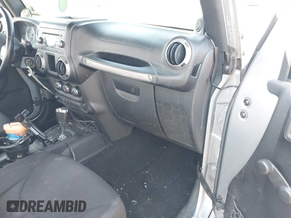 2013 Jeep Wrangler Sport with VIN 1C4AJWAG5DL639365, listed as a IAAI auction lot 40342277 with 117,109 mi miles and . Bid and sale history available at DreamBid. Image 5.