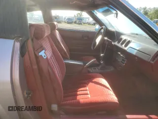 1983 Datsun 280ZX z VIN JN1HZ04S0DX560086, wystawiony jako Copart lot #79178604 z przebiegiem 183 309 mil mil oraz Szkody całkowita. Historia ofert i sprzedaży dostępna na DreamBid. Obrazek 10.