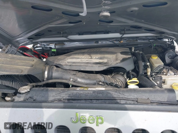 2015 Jeep Wrangler Unlimited Freedom with VIN 1C4BJWDG3FL682296, listed as a IAAI auction lot 42275536 with Not provided miles and . Bid and sale history available at DreamBid. Image 10.