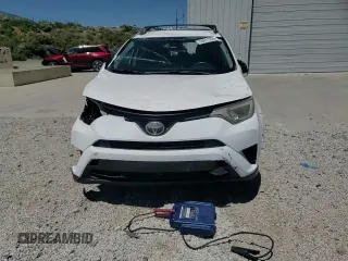2018 Toyota RAV4 LE z VIN JTMBFREV2JD253105, wystawiony jako Copart lot #58011225 z przebiegiem 68 130 mil mil oraz Szkoda całkowita • Salvage title. Historia ofert i sprzedaży dostępna na DreamBid. Obrazek 14.