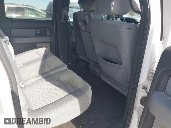 2012 Ford F-150 XL with VIN 1FTFW1CF9CFA94640, listed as a IAAI auction lot 41703729 with 216,291 mi miles. Bid and sale history available at carsss.com. Image 8.