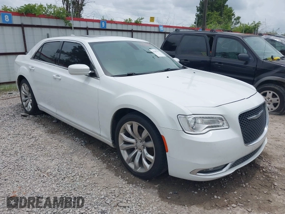 2016 Chrysler 300 Anniversary Edition z VIN 2C3CCAAG2GH343828, wystawiony jako IAAI lot #42291353 z przebiegiem 126 336 mil mil oraz . Historia ofert i sprzedaży dostępna na DreamBid. Obrazek 1.
