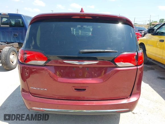 2019 Chrysler Pacifica Touring Plus z VIN 2C4RC1FGXKR706264, wystawiony jako IAAI lot #42416570 z przebiegiem 86 897 mil mil oraz . Historia ofert i sprzedaży dostępna na DreamBid. Obrazek 16.