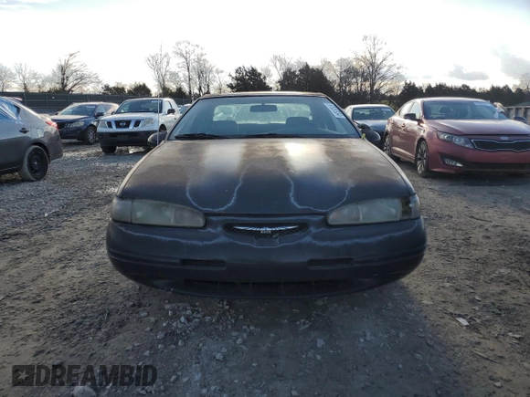 1996 Ford Thunderbird LX z VIN 1FALP62W1TH162826, wystawiony jako Copart lot #87037034 z przebiegiem 181 379 mil mil oraz Czysty tytuł • Clean title. Historia ofert i sprzedaży dostępna na DreamBid. Obrazek 5.