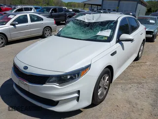 2016 Kia Optima LX z VIN 5XXGT4L3XGG080662, wystawiony jako IAAI lot #42048361 z przebiegiem 99 564 mil mil oraz . Historia ofert i sprzedaży dostępna na DreamBid. Obrazek 6.