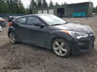 2014 Hyundai Veloster with VIN KMHTC6AD1EU186166, listed as a Copart auction lot 50207375 with 102,695 mi miles and Salvage Title. Bid and sale history available at carsss.com. Image 4.