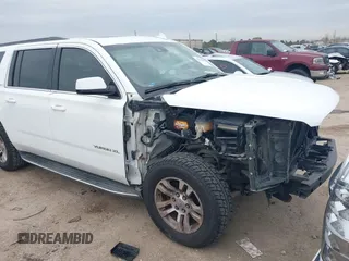 2015 GMC Yukon XL SLT with VIN 1GKS1HKCXFR652337, listed as a IAAI auction lot 41330287 with 139,268 mi miles. Bid and sale history available at carsss.com. Image 1.