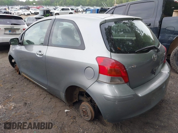 2010 Toyota Yaris with VIN JTDJT4K36A5301323, listed as a IAAI auction lot 42120502 with 32,324 mi miles. Bid and sale history available at carsss.com. Image 3.