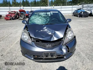 2013 Honda Fit с VIN JHMGE8H34DC069516, выставлен на аукционе Copart как лот 59993335 с пробегом 128 798 миль миль и Списание • Salvage title. История ставок и продаж доступна на DreamBid. Изображение 5.