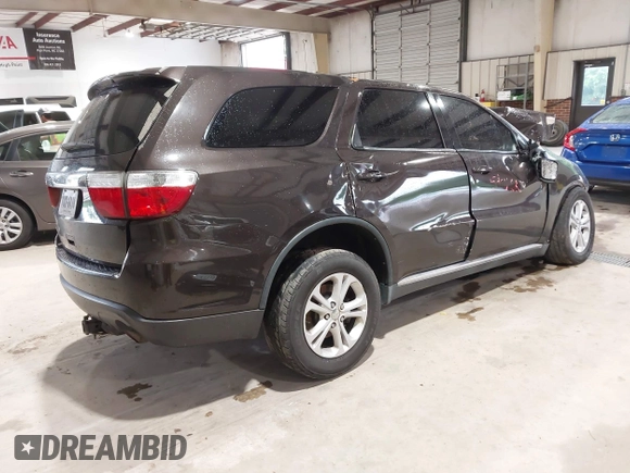 2013 Dodge Durango SXT with VIN 1C4RDJAG3DC540038, listed as a IAAI auction lot 42366965 with Not provided miles and . Bid and sale history available at DreamBid. Image 4.