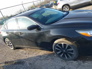 2018 Nissan Altima SV with VIN 1N4AL3AP0JC209978, listed as a IAAI auction lot 41958173 with 104,425 mi miles and . Bid and sale history available at DreamBid. Image 13.