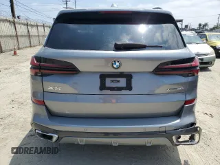 2024 BMW X5 xDrive40i z VIN 5UX23EU07R9T54418, wystawiony jako Copart lot #58960045 z przebiegiem 23 591 mil mil oraz Tytuł czysty. Historia ofert i sprzedaży dostępna na DreamBid. Obrazek 6.