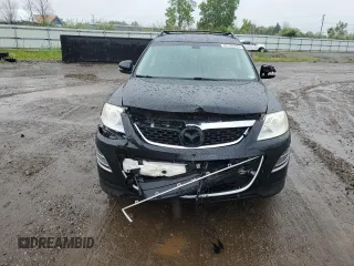 2012 Mazda CX-9 Grand Touring z VIN JM3TB3DA7C0364861, wystawiony jako Copart lot #60199255 z przebiegiem 153 477 mil mil oraz Szkoda całkowita • Salvage title. Historia ofert i sprzedaży dostępna na DreamBid. Obrazek 5.