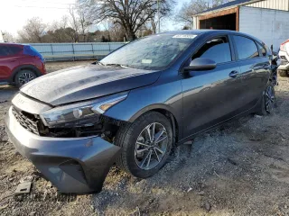 2023 Kia Forte LXS with VIN 3KPF24ADXPE693402, listed as a Copart auction lot 43716955 with 32,535 mi miles and Salvage Title. Bid and sale history available at carsss.com. Image 1.