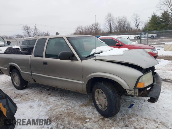 2003 GMC Sonoma SLS z VIN 1GTCS19X738237992, wystawiony jako IAAI lot #41345031 z przebiegiem 154 597 mil mil oraz . Historia ofert i sprzedaży dostępna na DreamBid. Obrazek 14.