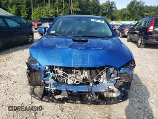 2015 Mitsubishi Lancer Evolution Final Edition z VIN JA32W7FV7FU608214, wystawiony jako Copart lot #68316174 z przebiegiem 56 714 mil mil oraz Szkody całkowita. Historia ofert i sprzedaży dostępna na DreamBid. Obrazek 5.