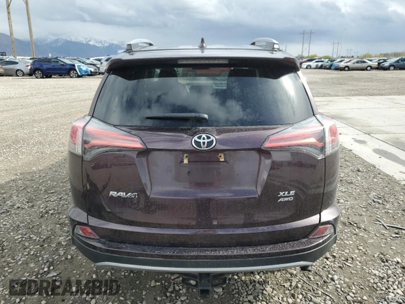 2018 Toyota RAV4 XLE with VIN 2T3RFREV3JW778241, listed as a Copart auction lot 51157395 with 74,317 mi miles and Salvage Title. Bid and sale history available at carsss.com. Image 6.