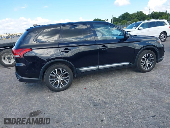 2018 Mitsubishi Outlander SE with VIN JA4AD3A33JZ055813, listed as a IAAI auction lot 41232885 with 126,457 mi miles and . Bid and sale history available at DreamBid. Image 4.