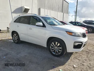 2012 Kia Sorento SX with VIN 5XYKW4A23CG218043, listed as a Copart auction lot 86247404 with 177,379 mi miles and Salvage Title. Bid and sale history available at carsss.com. Image 4.