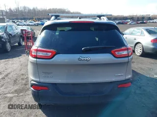 2014 Jeep Cherokee Altitude with VIN 1C4PJMCB5EW167961, listed as a IAAI auction lot 41660440 with 88,705 mi miles and . Bid and sale history available at DreamBid. Image 16.