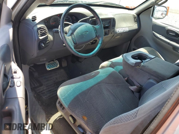 2001 Ford F-150 XL with VIN 1FTRX17W11NA24623, listed as a Copart auction lot 56767345 with 201,959 mi miles and Salvage title. Bid and sale history available at DreamBid. Image 8.