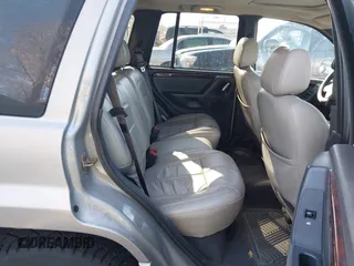 2001 Jeep Grand Cherokee Limited with VIN 1J4GW58N91C688438, listed as a IAAI auction lot 41830334 with 184,420 mi miles. Bid and sale history available at carsss.com. Image 8.
