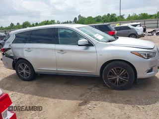 2019 Infiniti QX60 Luxe with VIN 5N1DL0MN0KC511333, listed as a IAAI auction lot 42070088 with 117,796 mi miles and . Bid and sale history available at DreamBid. Image 13.