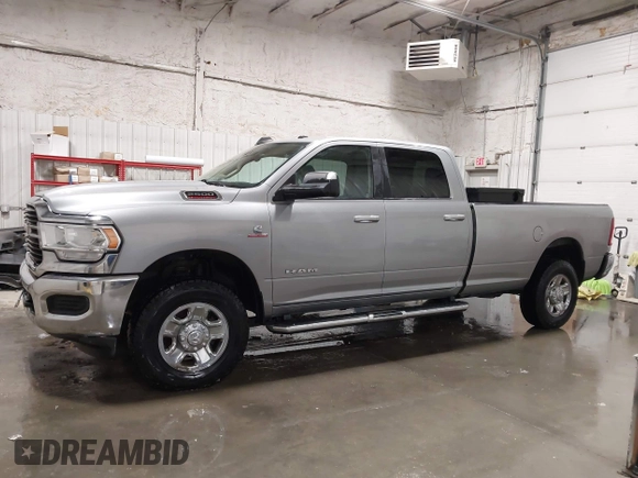 2020 Ram 2500 Big Horn z VIN 3C6UR5JL0LG116089, wystawiony jako IAAI lot #41433137 z przebiegiem 53 399 mil mil oraz . Historia ofert i sprzedaży dostępna na DreamBid. Obrazek 14.