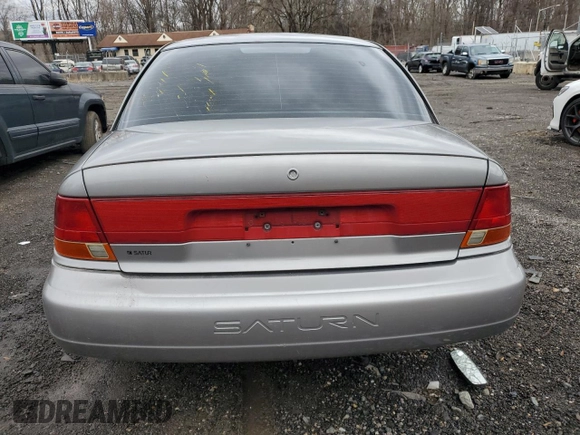 1999 Saturn SL with VIN 1G8ZK5271XZ174703, listed as a Copart auction lot 44570335 with 132,467 mi miles and Salvage Title. Bid and sale history available at carsss.com. Image 6.