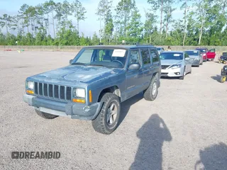 1999 Jeep Cherokee Sport with VIN 1J4FT68S9XL581835, listed as a IAAI auction lot 42499071 with 203,782 mi miles and . Bid and sale history available at DreamBid. Image 2.