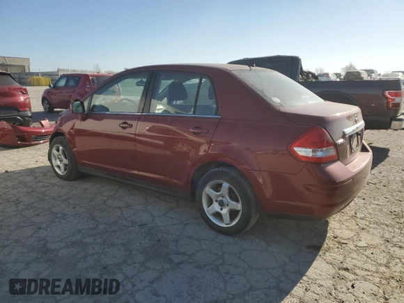 2009 Nissan Versa S with VIN 3N1BC11E29L372572, listed as a Copart auction lot 52817755 with 165,493 mi miles and Salvage Title. Bid and sale history available at DreamBid. Image 2.