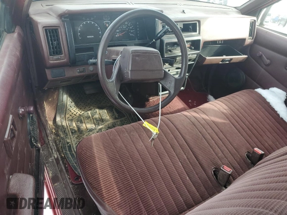 1993 Nissan Frontier z VIN 1N6SD11S0PC332903, wystawiony jako Copart lot #84039484 z przebiegiem 136 324 mil mil oraz Szkoda całkowita • Salvage title. Historia ofert i sprzedaży dostępna na DreamBid. Obrazek 8.