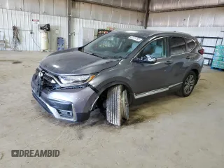 2021 Honda CR-V Touring with VIN 2HKRW2H98MH664625, listed as a Copart auction lot 43223795 with 59,210 mi miles and Salvage Title. Bid and sale history available at carsss.com. Image 1.