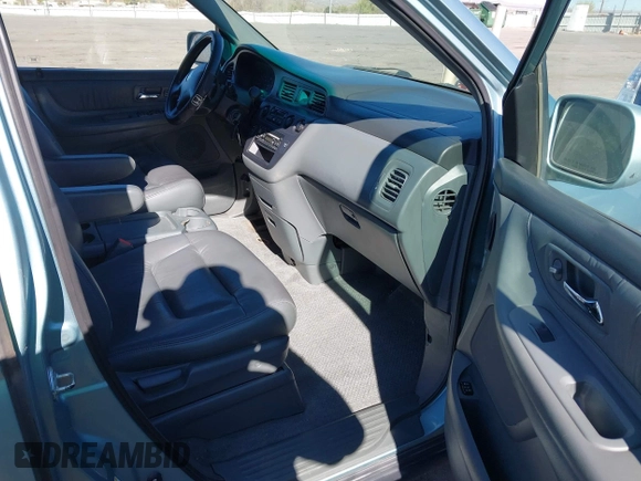 2004 Honda Odyssey EX-L with VIN 5FNRL18944B043710, listed as a IAAI auction lot 41862417 with 380,589 mi miles and . Bid and sale history available at DreamBid. Image 5.