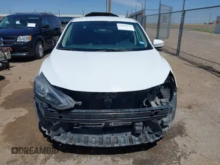 2019 Nissan Sentra S z VIN 3N1AB7AP5KY285776, wystawiony jako IAAI lot #41969976 z przebiegiem 87 187 mil mil oraz . Historia ofert i sprzedaży dostępna na DreamBid. Obrazek 13.