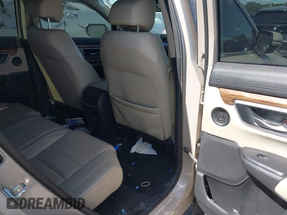 2018 Honda CR-V Touring with VIN 5J6RW1H98JL000031, listed as a IAAI auction lot 40605651 with 129,516 mi miles and . Bid and sale history available at DreamBid. Image 8.