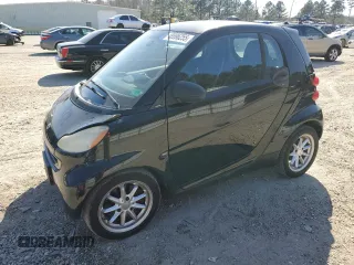 2009 Smart fortwo Pure with VIN WMEEJ31X89K213295, listed as a Copart auction lot 48996255 with 164,197 mi miles and Salvage Title. Bid and sale history available at carsss.com. Image 1.